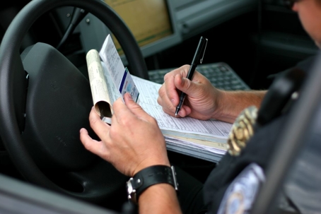 police writing traffic ticket